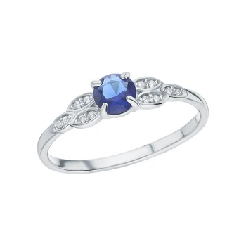 

Silver ring with cubic zirconia and Sapphire synthetic sunlight sample 925