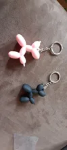 Nuevo creativo de dibujos animados globo de Llavero perro colgante anillo de hombres y mujeres par bolsa de llavero colgante venta al por mayor