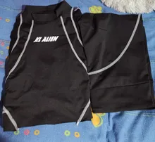 Kliou-conjunto deportivo de dos piezas para mujer, top de cuello alto con estampado de letras, leggings de retales a rayas, chándales clásicos de moda