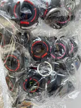 Llanta pequeña de dibujos animados para hombre y mujer, llanta pequeña creativa de moda colorida Unisex, bolso de simulación de neumático de coche, colgante de llavero, regalo para amantes del coche