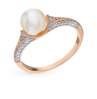 

Gold ring with cubic zirconia and pearls sunlight