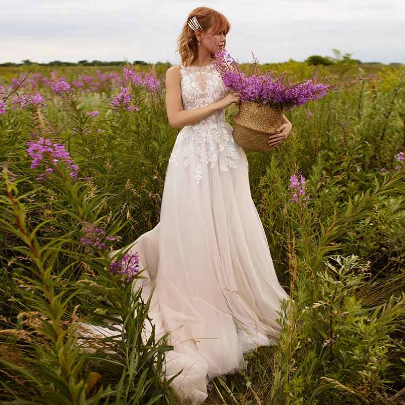 

Exquisite Sleeveless Wedding Dresses 2020 O-neck Appliques Sweep Train O-neck Tulle A-line Bridal Gowns
