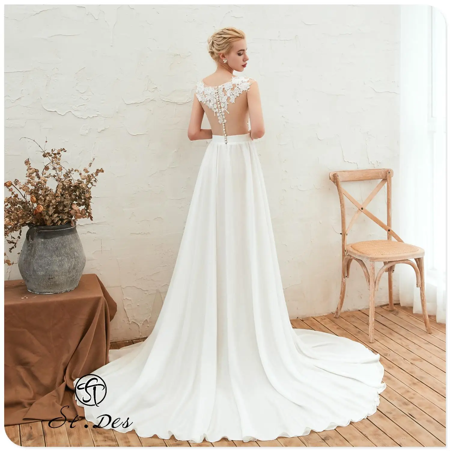 Nieuwe 2020 St. Des Ivoor A-lijn Russische Ronde Hals Mouwloze Kant Bloem Boho Floorlength Designer Elegante Trouwjurk Nieuwe 2020 St. Des Ivoor A-lijn Russische Ronde Hals Mouwloze Kant Bloem Boho Floorlength Designer Elegante Trouwjurk