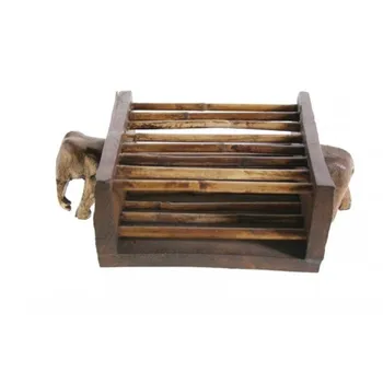 

Holder CDS with carving Elephant solid wood. Measures: 7x23x18 cm.
