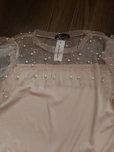 Blusa de manga larga ahuecada con volante elegante para otoño, camisa Sexy de malla transparente con cuentas y cuello redondo para mujer