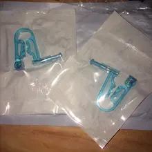 Unidad de Seguridad de Piercing de oreja estéril desechable, herramienta de salud, Kit de Asepsis, pistola de perforación Manual, 2 uds.