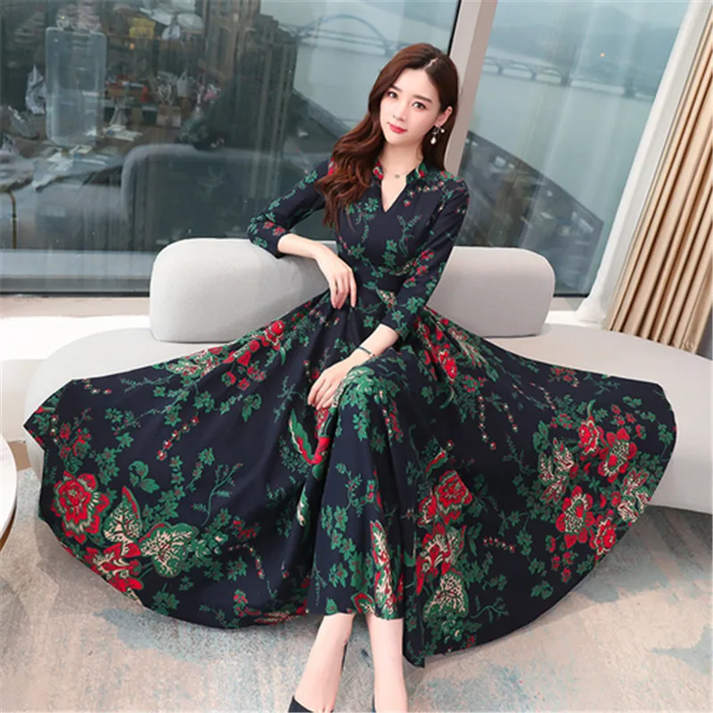 

Long-sleeved dress female 2020 spring new fashion temperament new V-neck print waist was thin and big swing long dress