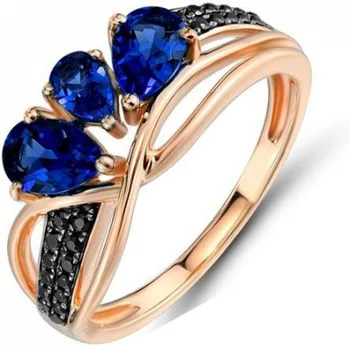 

Lucas gold ring with sapphires and diamonds in red gold