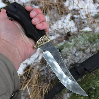 

Knife fisherman with a blade of forged steel 95x18 with the traces of forging from the hammer