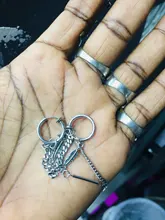 Ídolo KPOP ADN chicos coreanos PERNO DE ACERO INOXIDABLE pendientes de la pluma de cadena larga de las mujeres de los hombres de Rock Grunge Hipster Punk Unisex Clip de oreja