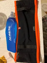 Aonijie-Bolsa para cintura al aire libre para correr, paquetes de cintura ultraligeros portátiles, soporte de teléfono para acampar, con frasco blando de agua