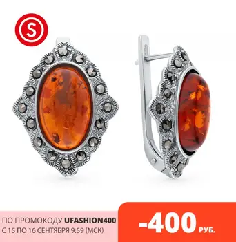 

Silver earrings with marcasite and amber sunlight