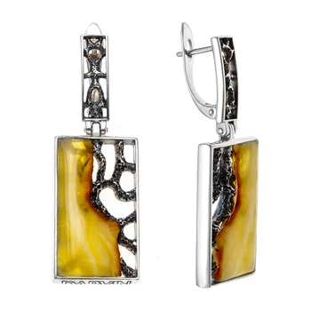 

Earrings made of silver with Amber White