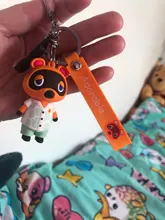 De dibujos animados lindo Animal muñeca coche llavero para hombre y mujeres amantes juego Animal cruce clave anillo pequeño de la bolsa del teléfono móvil llavero