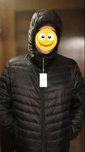 Chaqueta de plumón ligera para hombre, ropa de calle coreana con plumas, abrigo cálido con cuello levantado, marca de moda de invierno 2021