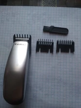 Kemei-Mini Afeitadora eléctrica portátil para hombre, maquinilla de afeitar Máquina para cortar cabello Barba, 3 peines