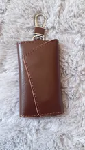Billetera de cuero genuino de vaca para hombre y mujer, bolsa para llaves multifunción con hebilla de calidad a la moda, organizador de llaves con los titulares de ama de llaves