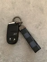 LLavero de cuero con diseño cuadrado para hombre y mujer, llaveros de cordón, llavero de coche a la moda, accesorios para llaves