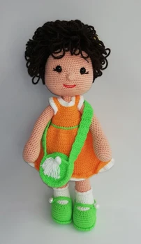 

Amigurumi Oyuncak Çantalı Kız Bebek