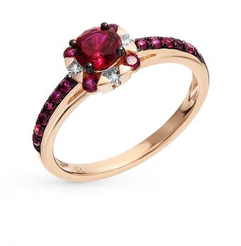 

Gold ring with rubies and diamonds sunlight