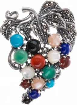 

Yuk marcasite brooch with a scatter of colored stones made of silver