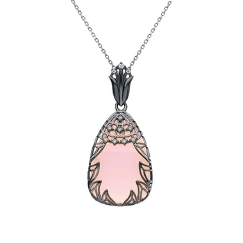 

Silver Pendant with cubic zirconia and imitations of sunlight sample 925