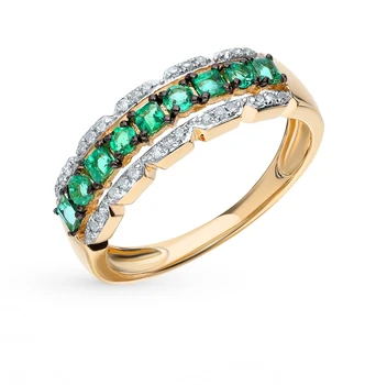 

Gold ring with emeralds and diamonds sunlight