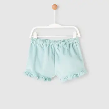 

Green baby SHORTS with ruffles