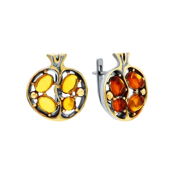 

Silver earrings with amber sunlight