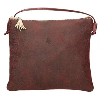 

1ª quality leather shoulder bag, with zipper closure tassel trim, 22x19x2 cm. Garnet