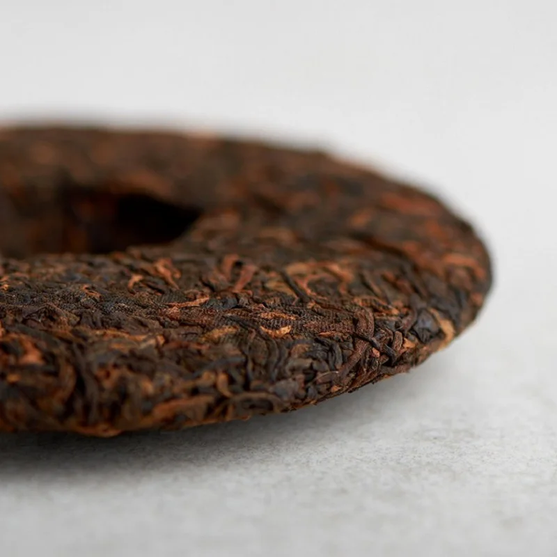 Tea Shu Puer Yiwu Xiao Bin, 2021, tea cake 100 grams. Puer, Puer tea, Puer top grade, Puer pancake, Puer 357, Puer pressed, Shu Puer,  Shu Puer top grade, Shu Puer tea, Shu Puer invigorating, Shu Puer menghai, Pu er