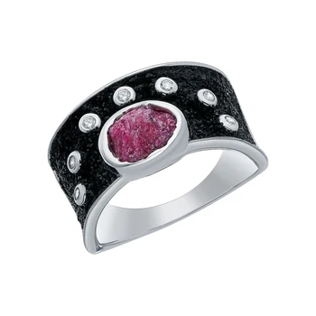 

Silver ring with corundum sunlight sample 925