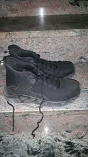 Zapatos de seguridad ligeros para exteriores transpirables antideslizantes EVA puntera de acero impermeable botas deportivas para hombres construcción de pinchazos zapatos de trabajo para mujeres