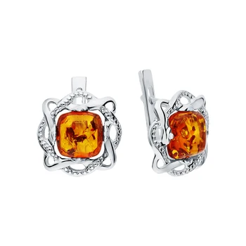 

Silver earrings with amber sunlight