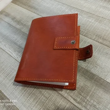 

Planner notebook with cover A5 genuine leather handmade with interchangeable block 80 sheets in line. Business gift.