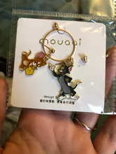 Pendientes con diseño de gato y ratón para mujer, aretes largos y salvajes con Clips para las orejas, joyería sencilla