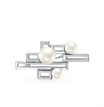 

Silver brooch with cubic zirconia and pearls sunlight sample 925 test