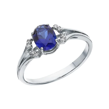 

Silver ring with cubic zirconia and Sapphire synthetic sunlight sample 925