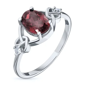 

White gold ring with garnet and Diamond жд09к121807х