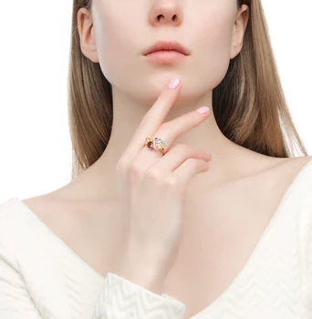 

Gold ring with хризолитом, amethyst, Topaz, garnet, citrine and diamonds sunlight sample 585