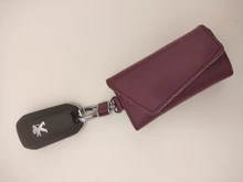 Billetera de cuero genuino de vaca para hombre y mujer, bolsa para llaves multifunción con hebilla de calidad a la moda, organizador de llaves con los titulares de ama de llaves