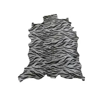 

Zerimar mat natural goatskin with tiger print 95x80 cm