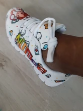 ELVISWORDS-zapatillas deportivas Kawaii con dibujo de enfermera para mujer, zapatos planos informales para la salud, diseño paramédico, transpirables, 2021