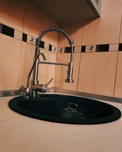 Grifos de latón para fregadero de cocina, escobilla, Palanca única, resorte extraíble, mezcladores, agua fría y caliente, grúa 9009