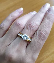 DOTIFI 316L anillos de acero inoxidable para mujeres clásico elevado 4 diente único Zirconia boda anillo de la joyería