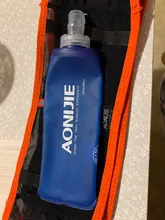 Aonijie-Bolsa para cintura al aire libre para correr, paquetes de cintura ultraligeros portátiles, soporte de teléfono para acampar, con frasco blando de agua
