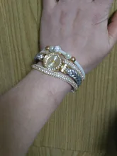 Reloj de pulsera redondo para mujer, hermoso brazalete de moda, creativo y elegante encantador
