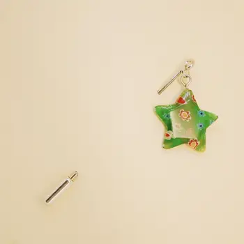 

Brooch on lapel star 51488 (green, needle, glass)