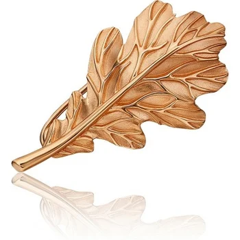 

Yuz platinum brooch in red gold
