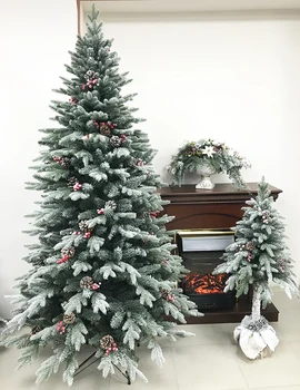 

Fir artificial PVC refractory with pine cones (white and red) automatic. The Christmas tree is snowflake, with cones and berries. 1.2m-1.8m